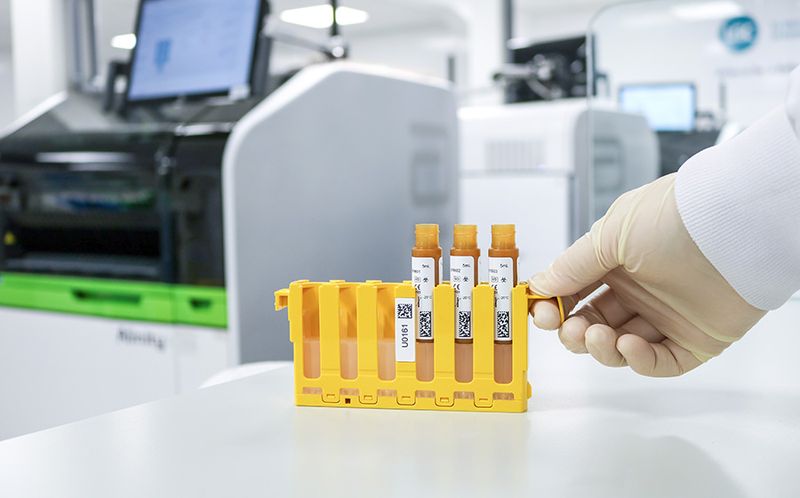A technologist pipettes from Multichem IA Plus vial